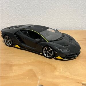 Sleek Black and Yellow Toy Sports Car